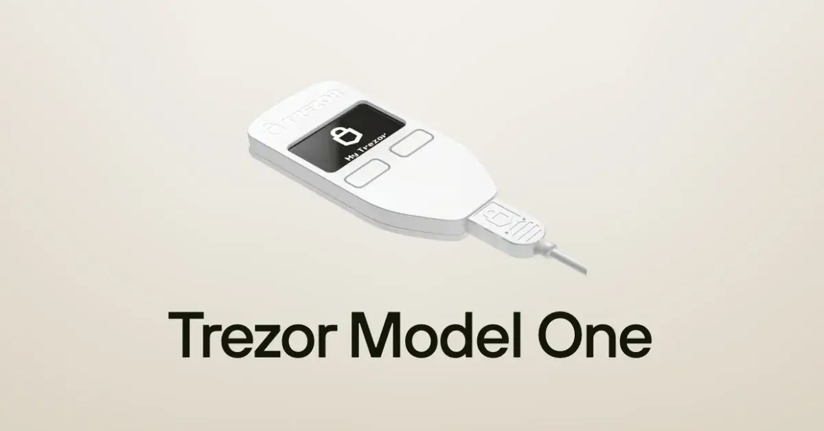 Two-button hardware wallet beside a protective metal shield and micro-USB cable