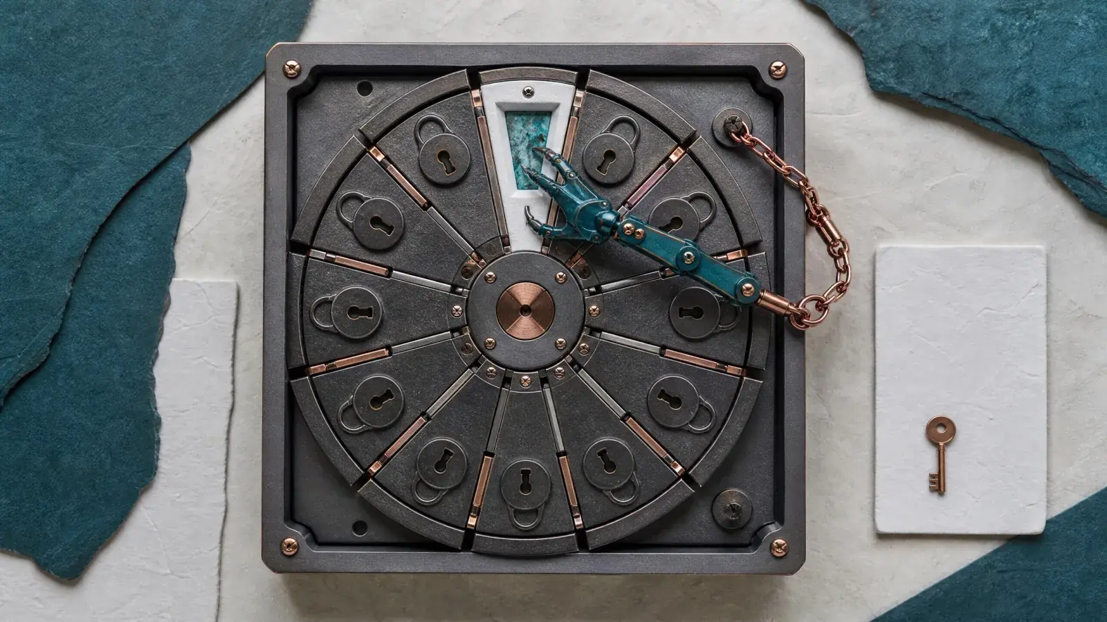 Segmented metal wallet vault with a constrained mechanical hand permitted to reach one compartment and one separate key