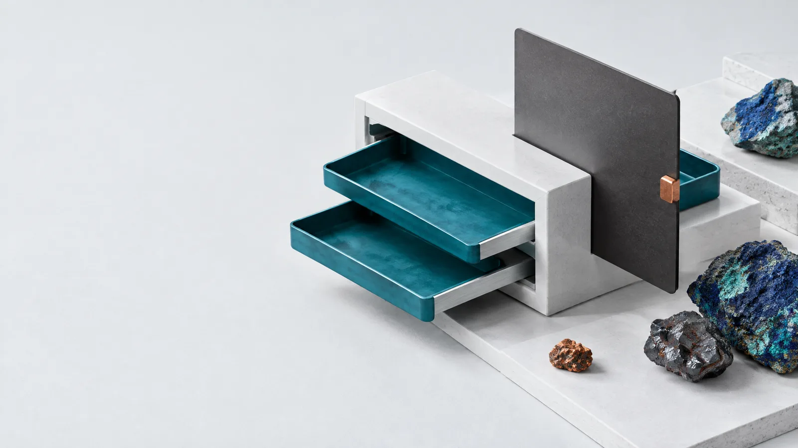 Teal wallet trays slide into a shared white rack while one tray stays behind a graphite privacy screen